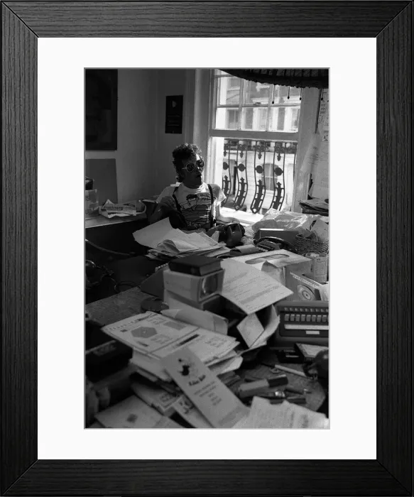 Framed Print : Rock Star Ian Dury poses during an exclusive interview for the Daily Mirror in his Framed Print : Rock Star Ian Dury poses during an exclusive interview for the Daily Mirror in his