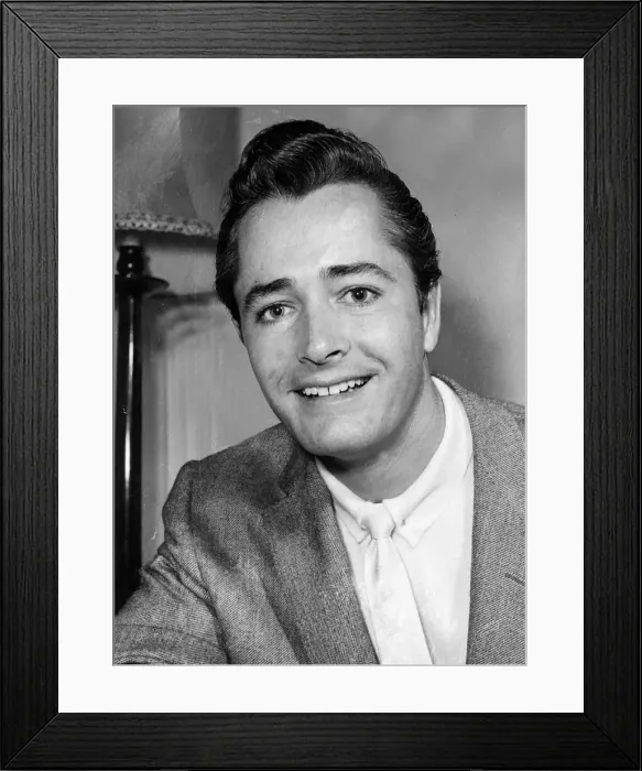 Framed Print : John Derek actor and film director 1956