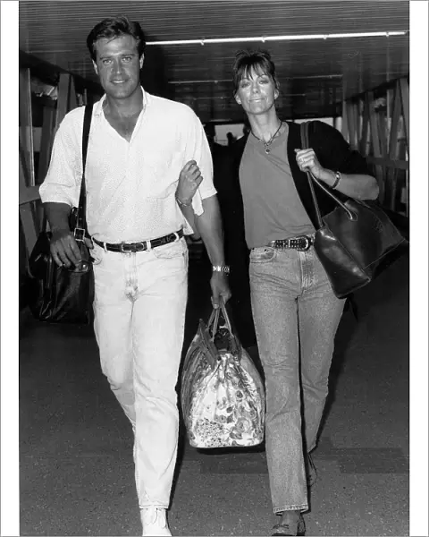Actor John James and new wife Denise Coward in June 1989 at London Heathrow