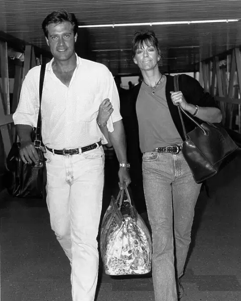 Actor John James and new wife Denise Coward in June 1989 at London Heathrow