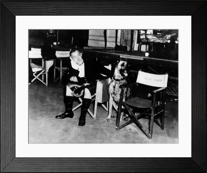 Framed Print : Actor Alec Guinness patting a doberman dog on set of film To Paris with Love Framed Print : Actor Alec Guinness patting a doberman dog on set of film To Paris with Love