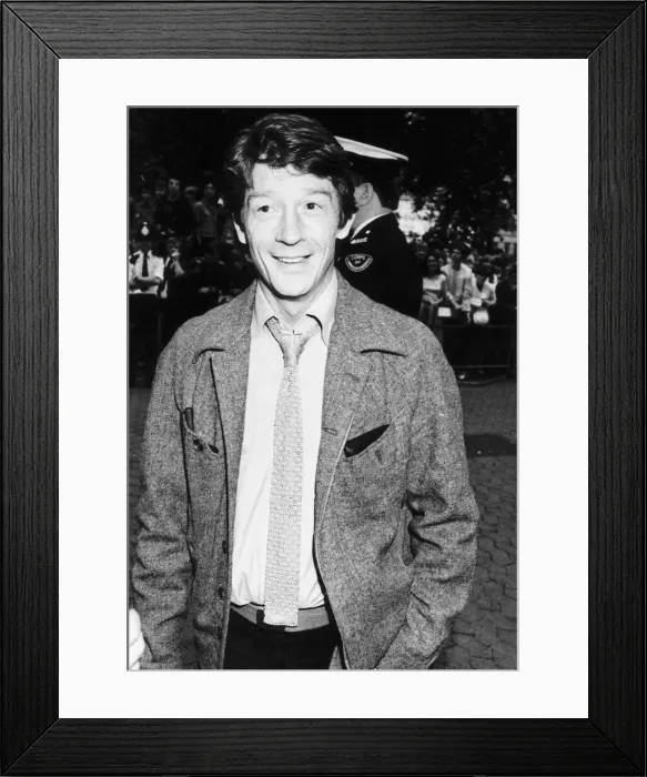 Framed Print : John Hurt British film actor entering film premiere in July 1982 Framed Print : John Hurt British film actor entering film premiere in July 1982