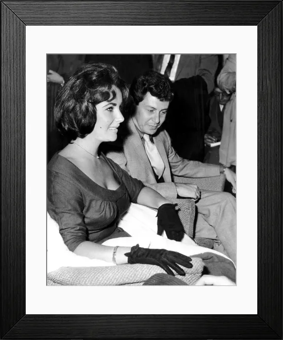 Framed Print : Eddie Fisher With Wife Elizabeth Taylor Actress At London Airport Where They Are Being