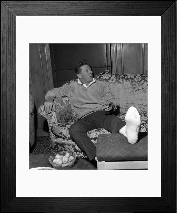 Framed Print : Danny Kaye at the Dorchester Hotel London nursing his badly burned foot He