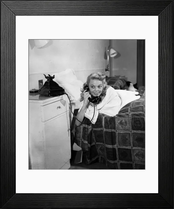 Framed Print : Actress Jean Porter speaking on the telephone October 1952 Framed Print : Actress Jean Porter speaking on the telephone October 1952