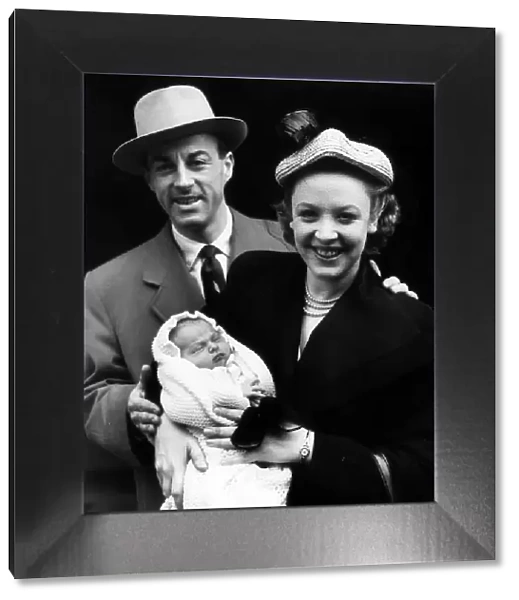 Actress Joy Nichols with her husband and baby March 1952