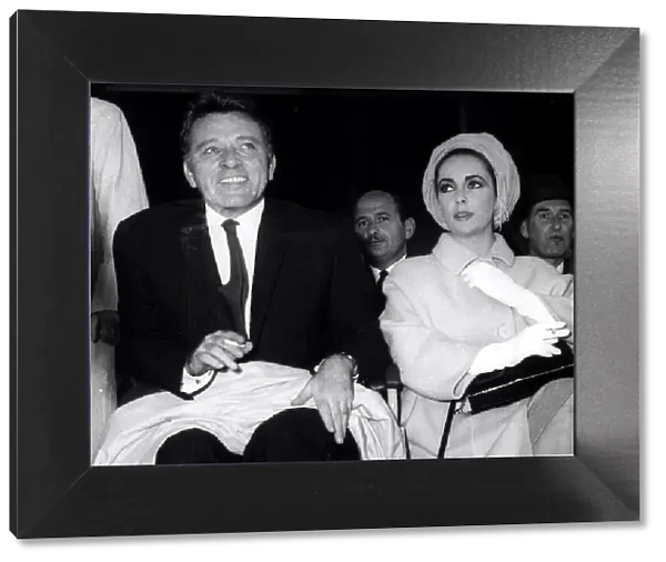 Elizabeth Taylor and Richard Burton at the Cooper-Clay fight at Wembley Stadium 1963