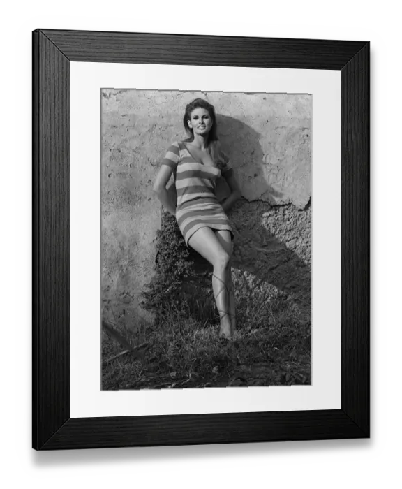 Framed Print : Actress Raquel Welch on location for film shoot 1966 Wearing striped mini dress Framed Print : Actress Raquel Welch on location for film shoot 1966 Wearing striped mini dress
