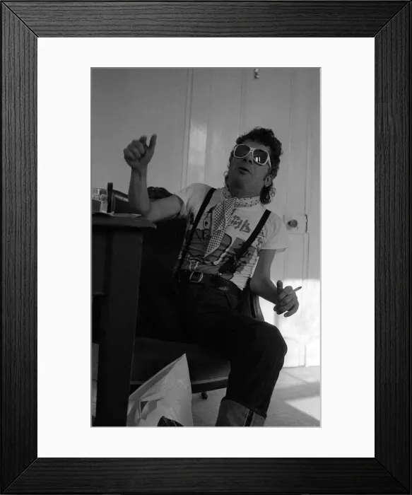 Framed Print : Rock Star Ian Dury poses during an exclusive interview for the Daily Mirror in his