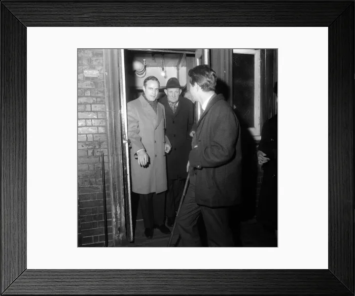 Framed Print : Marlon Brando actor and Trevor Howard April 1964 leaving the Queens Theatre Framed Print : Marlon Brando actor and Trevor Howard April 1964 leaving the Queens Theatre