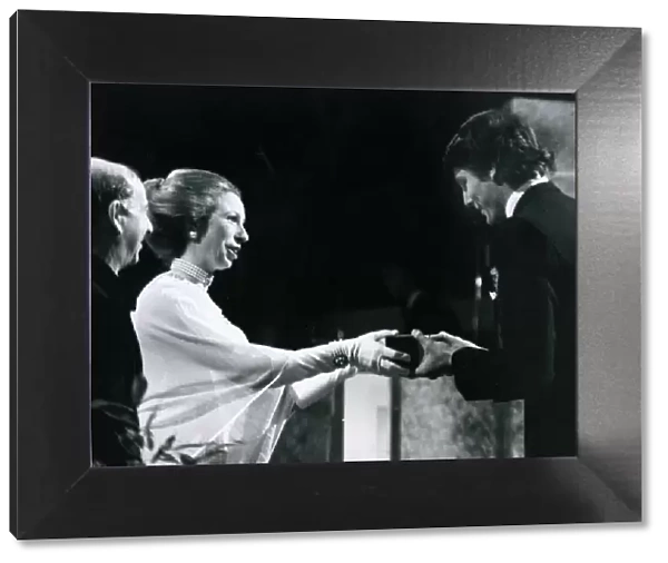 Princess Anne presents actor Christopher Reeve with the BAFTA award for the most