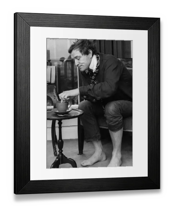 Framed Print : Richard Harris Irish actor dunking biscuit into tea 1965 Framed Print : Richard Harris Irish actor dunking biscuit into tea 1965