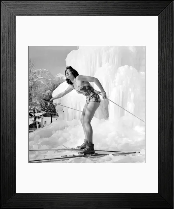 Framed Print : Winter Olympic Games 1956 Model in swimwear posing with skis on the ice - Framed Print : Winter Olympic Games 1956 Model in swimwear posing with skis on the ice -