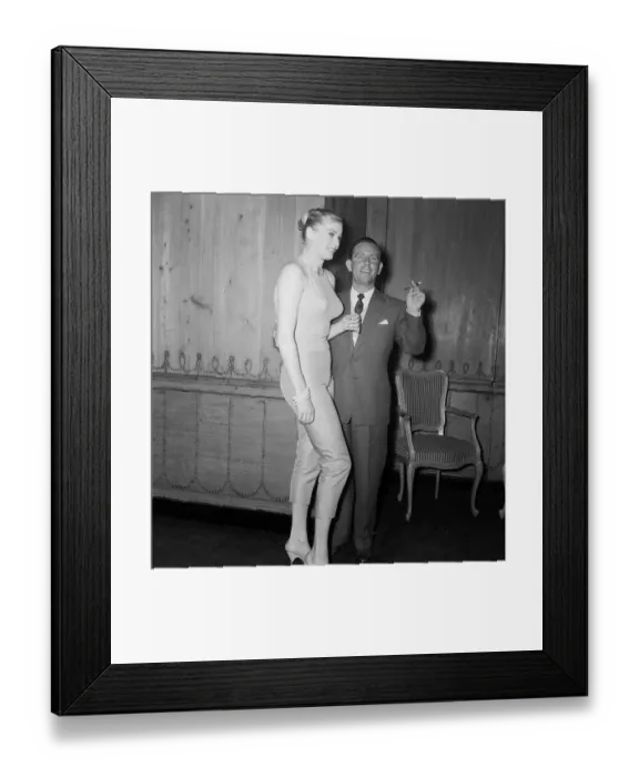 Framed Print : Actor and comedian Norman Wisdom enjoys a cup of tea with actress Anita Ekberg