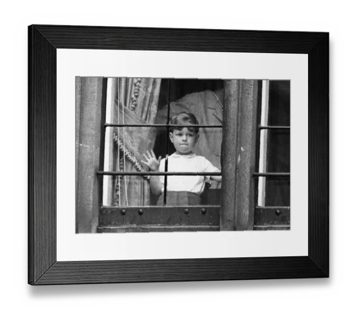 Framed Print : Prince Andrew as a boy behind window looking out of glass April 1963