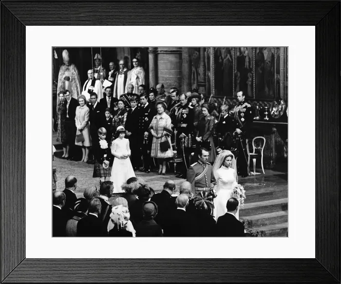 Framed Print : Princess Anne and Captain Mark Phillips walking down the aisle after their wedding