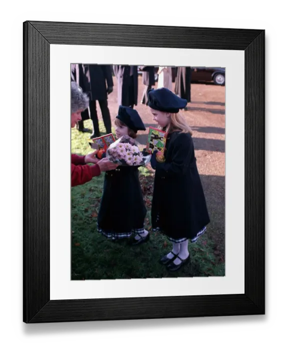 Framed Print : Princess Beatrice and Princess Eugenie receive presents Framed Print : Princess Beatrice and Princess Eugenie receive presents