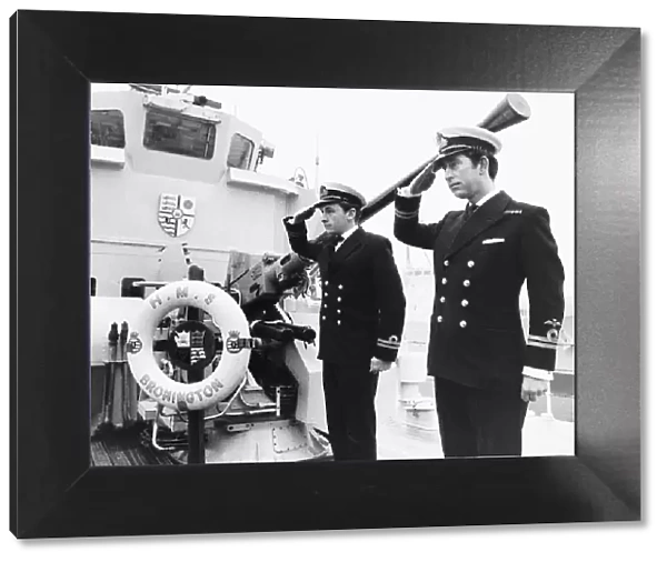 Prince Charles leaving the Royal Navy saluting his shipmates aboard the minehunter