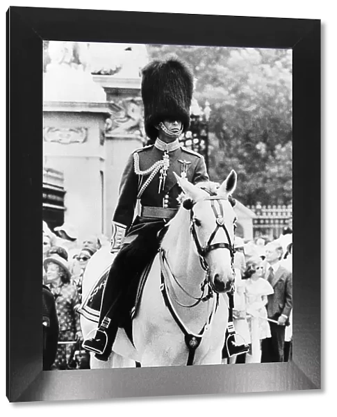 Prince Charles as Colonal-in-Chief of the Welsh Guards riding in the Trooping of