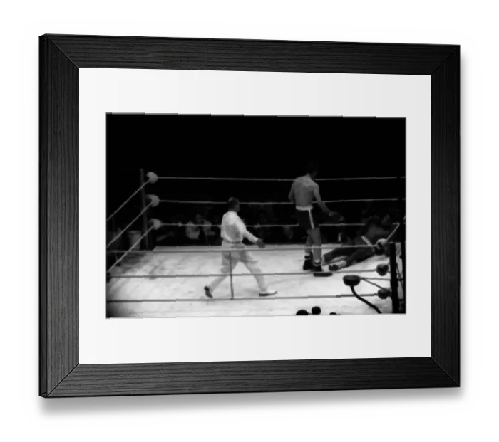 Framed Print : Action during the non-title heavyweight fight between American Cassius Clay