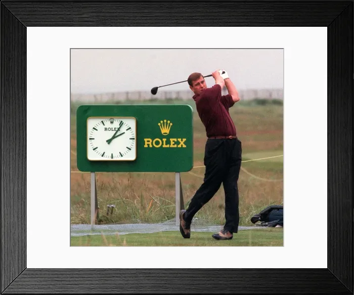 Framed Print : Prince Andrew playing golf at Royal Troon, July 1997 Rolex logo clock in background Framed Print : Prince Andrew playing golf at Royal Troon, July 1997 Rolex logo clock in background