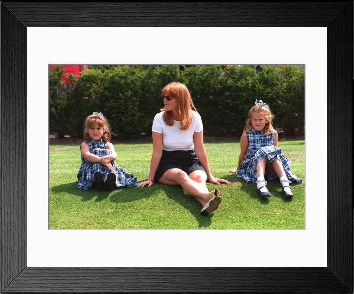 Framed Print : Duchess of York sits on the grass with Princess Eiugenie Framed Print : Duchess of York sits on the grass with Princess Eiugenie