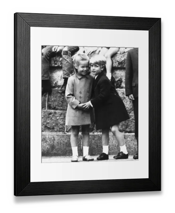 Framed Print : Prince Edward gives a hug and a kiss to Sarah during his mother