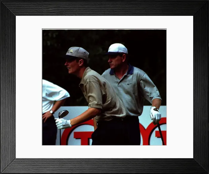 Framed Print : Justin Rose under the watchful eye of his hero Nick Price as they practice for the Dutch Framed Print : Justin Rose under the watchful eye of his hero Nick Price as they practice for the Dutch