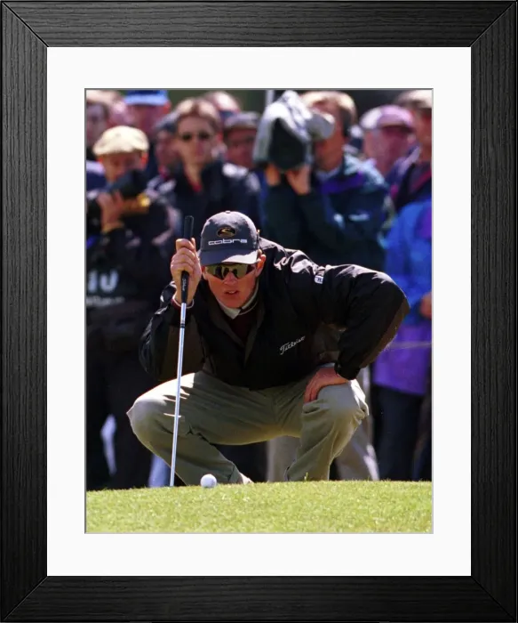 Framed Print : JUstin Rose lines up a putt on the green of the fourth hole during the third round of Framed Print : JUstin Rose lines up a putt on the green of the fourth hole during the third round of