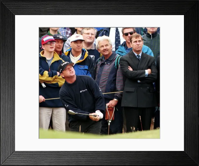 Framed Print : Prince Andrew watches Ian Woosham play out of a bunker during the third round of the Open Framed Print : Prince Andrew watches Ian Woosham play out of a bunker during the third round of the Open