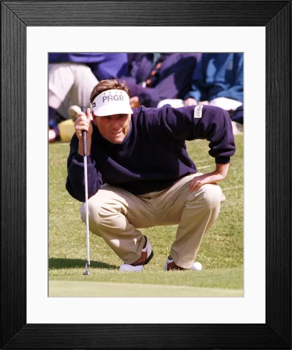 Framed Print : Brian Watts lines up a putt on the third hole during the third round of the Open Golf Framed Print : Brian Watts lines up a putt on the third hole during the third round of the Open Golf