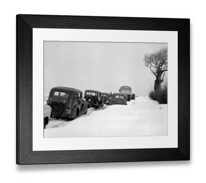 Framed Print : Snowed up roads in Bath - Stroud Road Traffic builds as cars are abandoned