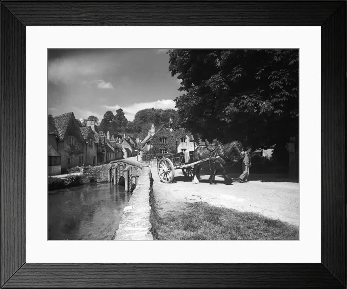 Framed Print : A country scene in Castle Combe, Wiltshire, 1943 A man