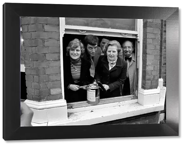 Margaret Thatcher seen here handing over the keys, a can of paint