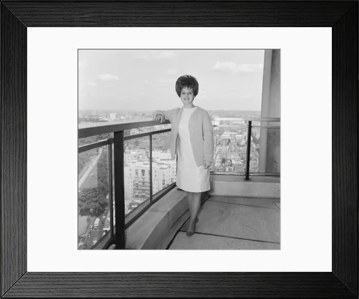 Framed Print : American pop singer Brenda Lee on the balcony outside her room at the Hilton Hotel in Framed Print : American pop singer Brenda Lee on the balcony outside her room at the Hilton Hotel in