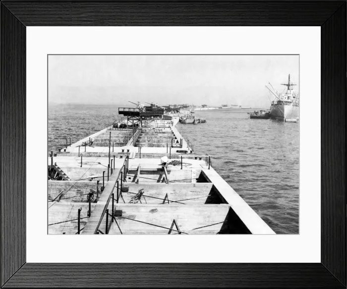 Framed Print : A liberty ship inside the outer wall of the Mulberry harbour just off of Gold beach Framed Print : A liberty ship inside the outer wall of the Mulberry harbour just off of Gold beach