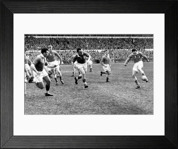 Framed Print : JBG Thomas Collection - Wales v France, Cardiff 1956. Cliff Morgan kicking the ball Framed Print : JBG Thomas Collection - Wales v France, Cardiff 1956. Cliff Morgan kicking the ball