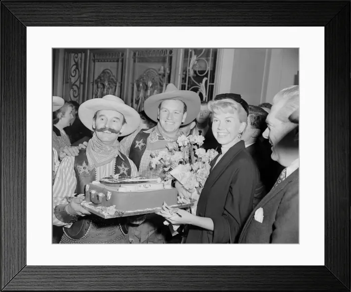 Framed Print : American singer and actress Doris Day pictured with men dressed in cowboy outfits Framed Print : American singer and actress Doris Day pictured with men dressed in cowboy outfits