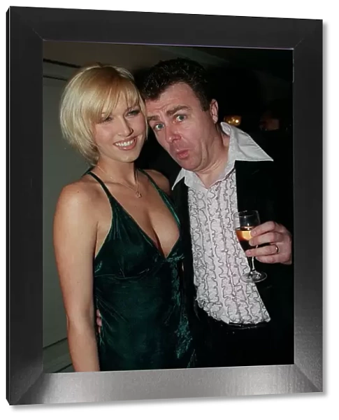 Paul Ross TV Presenter April 98 At Planet Hollwood with his arm round model Emma