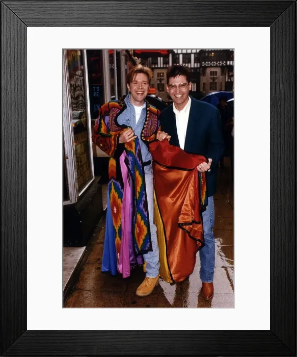Framed Print : TV Presenter Phillip Schofield handing over The Dreamcoat to Darren Day who will go on to Framed Print : TV Presenter Phillip Schofield handing over The Dreamcoat to Darren Day who will go on to