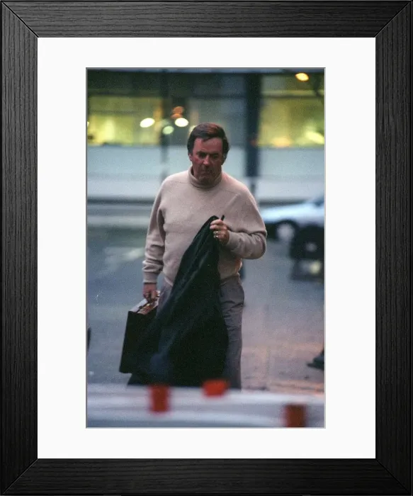 Framed Print : Terry Wogan TV Presenter December 98 Outside BBC studio in london carrying jacket Framed Print : Terry Wogan TV Presenter December 98 Outside BBC studio in london carrying jacket