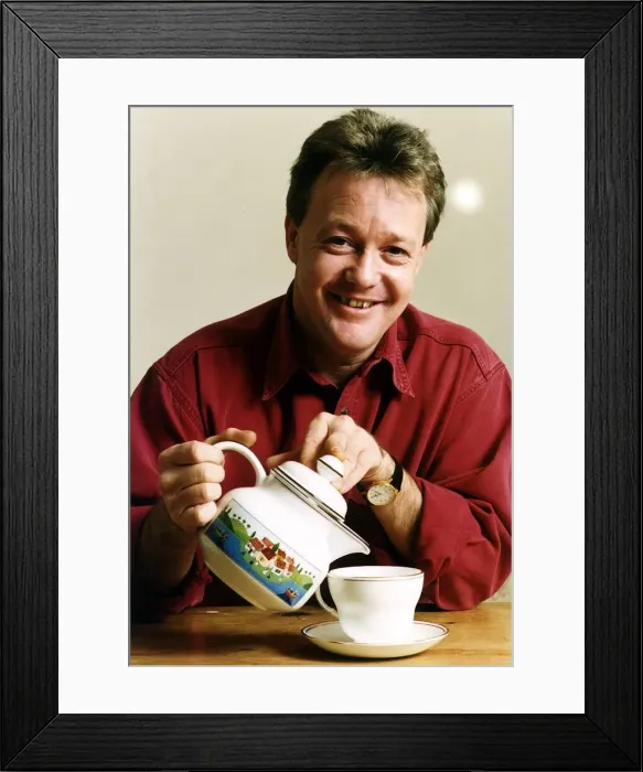 Framed Print : Keith Chegwin TV Presenter pouring a cup a tea Framed Print : Keith Chegwin TV Presenter pouring a cup a tea