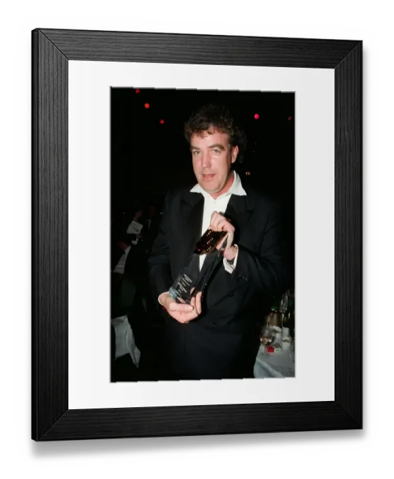 Framed Print : Jeremy Clarkson TV Presenter March 98 Holding award for best tv car show