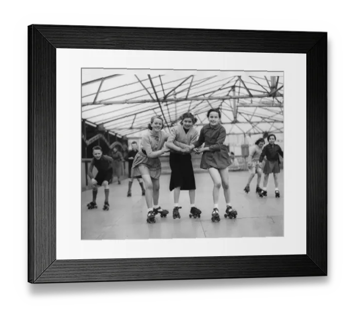 Framed Print : Three young roller skaters on the open air skating rink at Seaburn, l to r, May Harker
