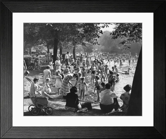 Framed Print : Families enjoying the summer weather in Brandling Park in Newcastle - paddling in Framed Print : Families enjoying the summer weather in Brandling Park in Newcastle - paddling in