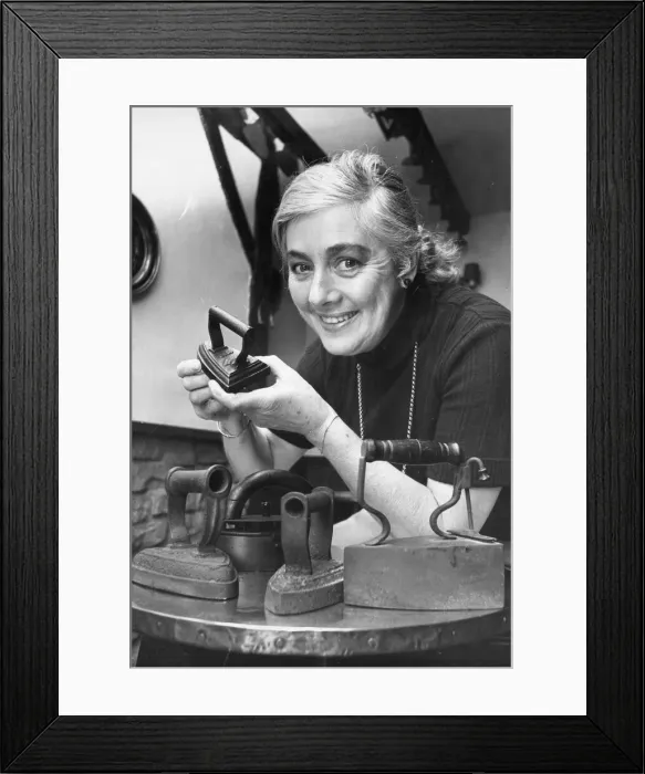 Framed Print : Bette Trotter collecting antique flat irons at the Stamford Cot pub near Alnwick Framed Print : Bette Trotter collecting antique flat irons at the Stamford Cot pub near Alnwick
