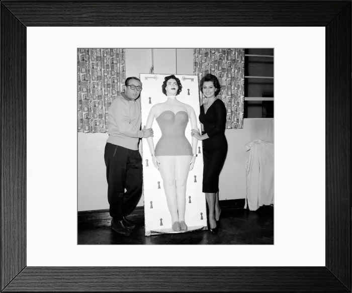 Framed Print : Actress Sophie Loren seen here standing beside a life size cake of her self Circa Framed Print : Actress Sophie Loren seen here standing beside a life size cake of her self Circa