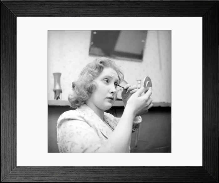 Framed Print : Valerie Pearce seen here applying masscara getting ready for a night on the town Framed Print : Valerie Pearce seen here applying masscara getting ready for a night on the town