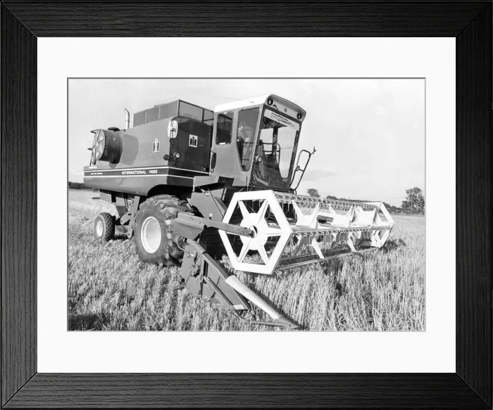 Framed Print : A brand new combine harvester ready to be used