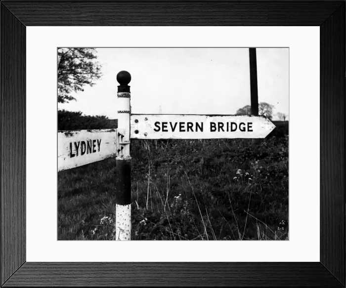 Framed Print : A road sign points the way to the recently completed Severn Bridge - 23rd April 1967 Framed Print : A road sign points the way to the recently completed Severn Bridge - 23rd April 1967